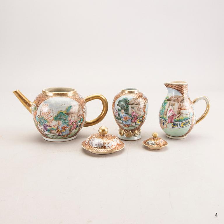 A Chinese Qianlong porcelain teapot, creamer and tea caddy.