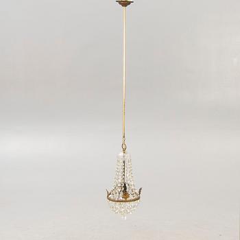 An early 1900s ceiling pendant.