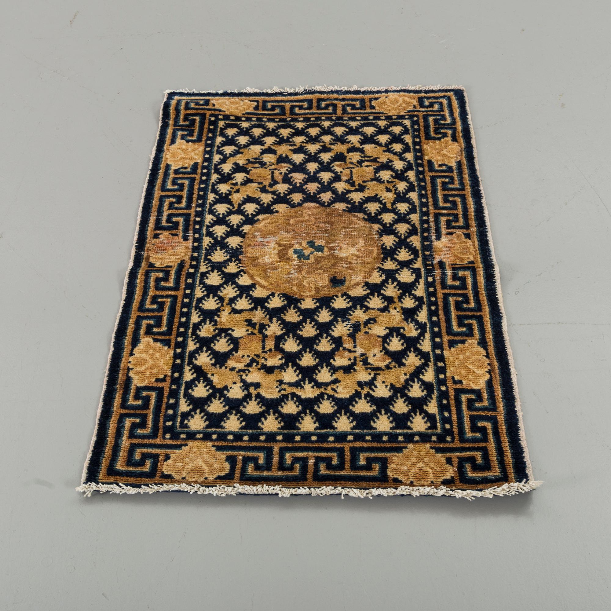 A semiantique Chinese Ningxia carpet ca 94 x 58 cm.