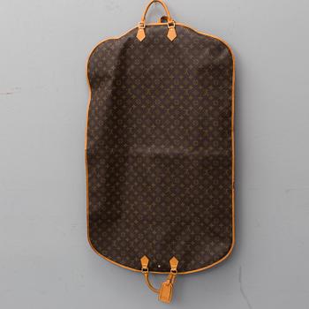 LOUIS VUITTON, a 'Housse Porte-Habits' garment bag.