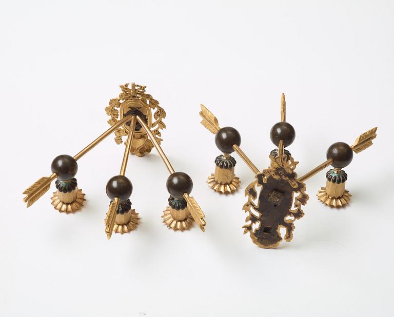 A pair of Empire three-light wall-lights, early 19th century Stockholm or St Petersburg.