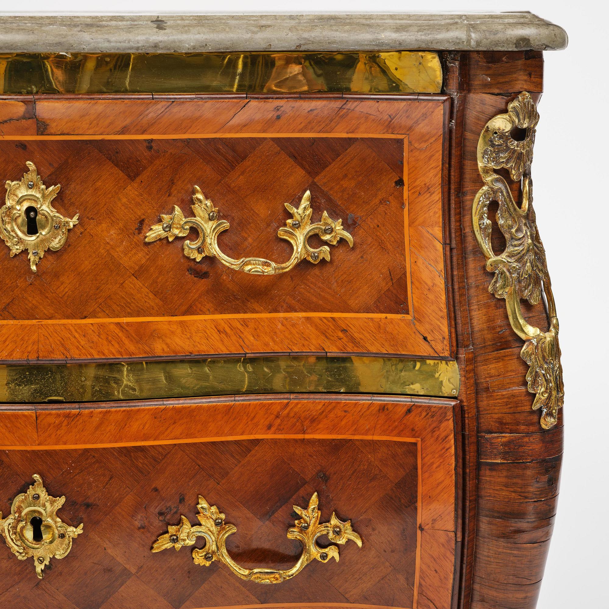 A rococo parquetry commode by C. Linning (master in Stockholm 1744-79).