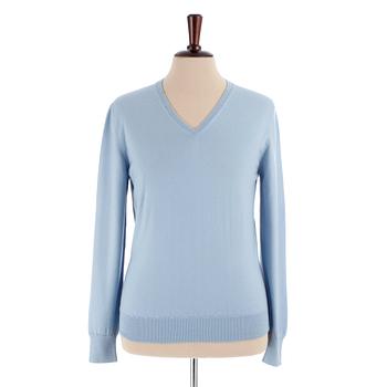 297. YVES SAINT LAURENT, a men's blue wool sweater, size M.