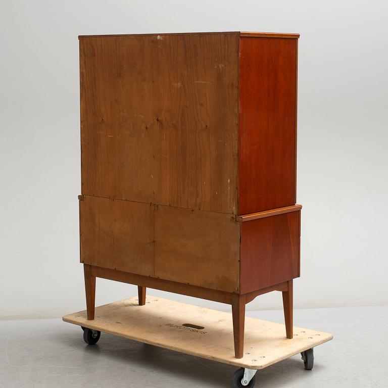 A 1950/60s mahogany veneered cabinet.