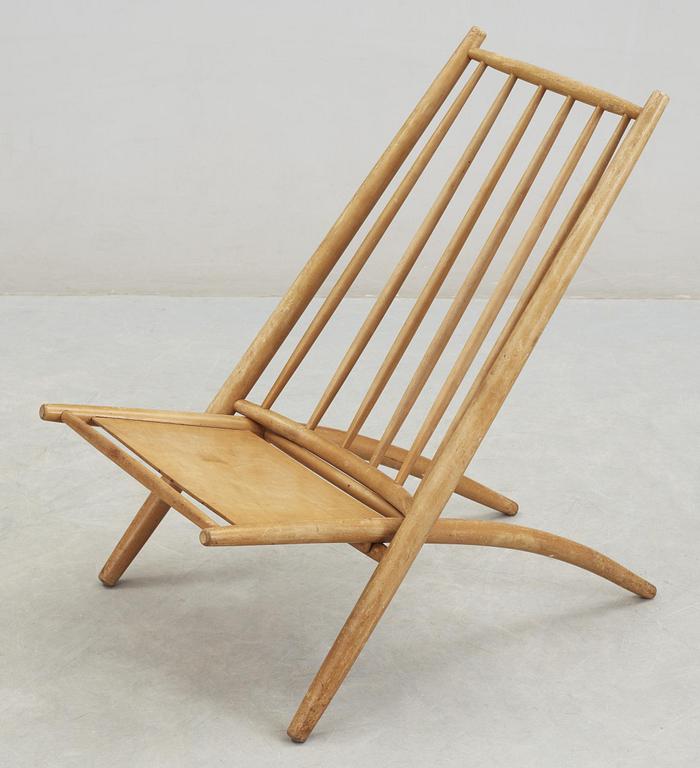 An Ilmari Tapiovaara beech 'Kongo' folding chair, Asko, Finland.