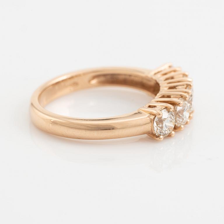 Brilliant cut diamond five stone ring.