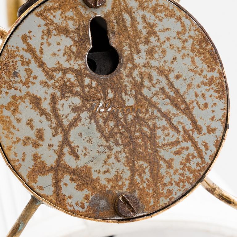 A mid-20th-century table lamp
/wall light for Idman.