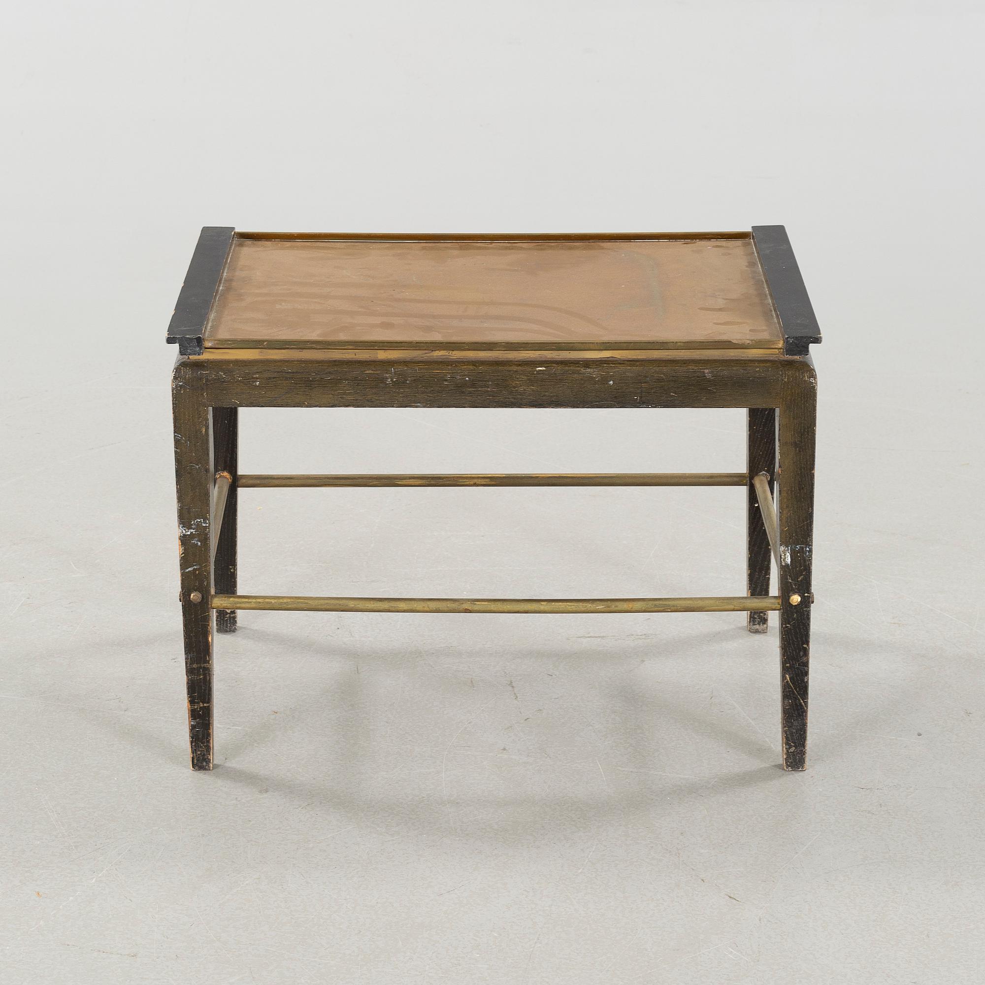 A tray table from the first half of the 20th century by Ystad Brons.