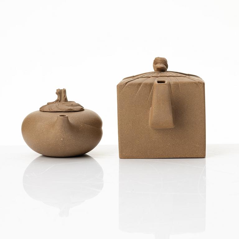 Two yellow yixing teapots, China, 1980/90s.