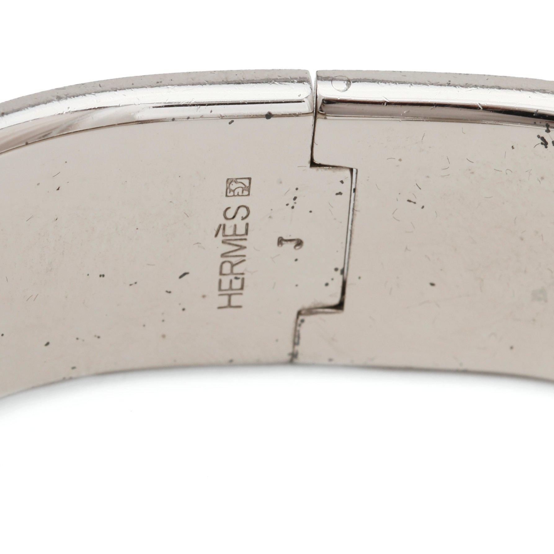HERMÈS, a white enameled bracelet, "Clic H".