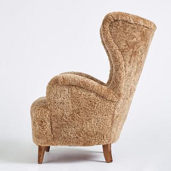 Otto Schulz, a Swedish Modern sheepskin upholstered armchair, Boet Gothenburg 1940s.