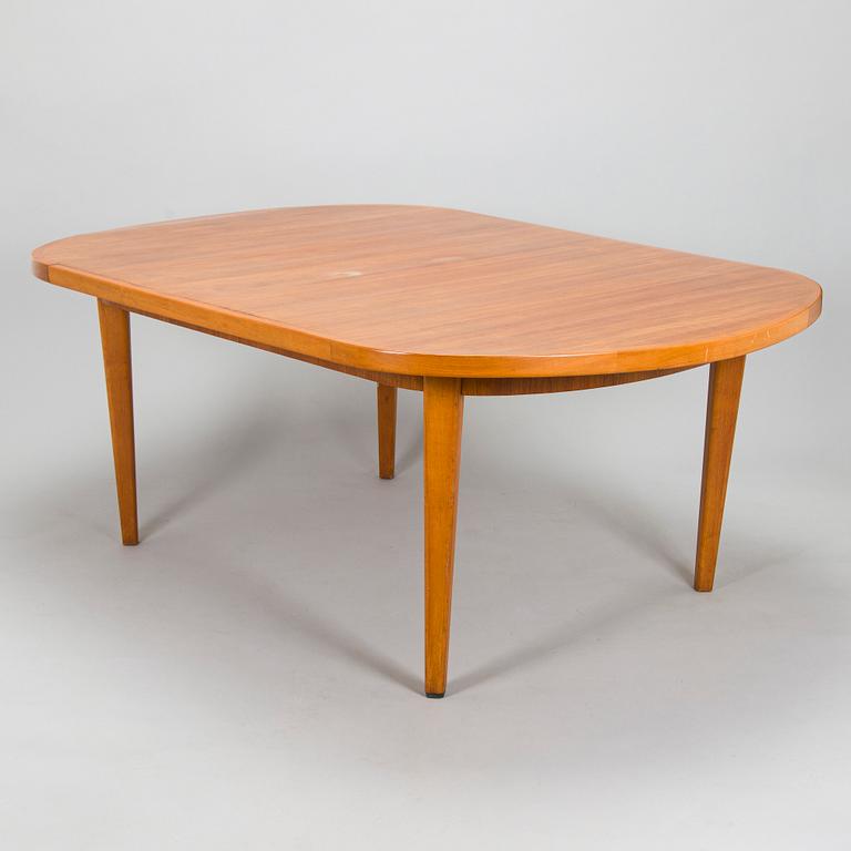 A mid-20th century dining table.