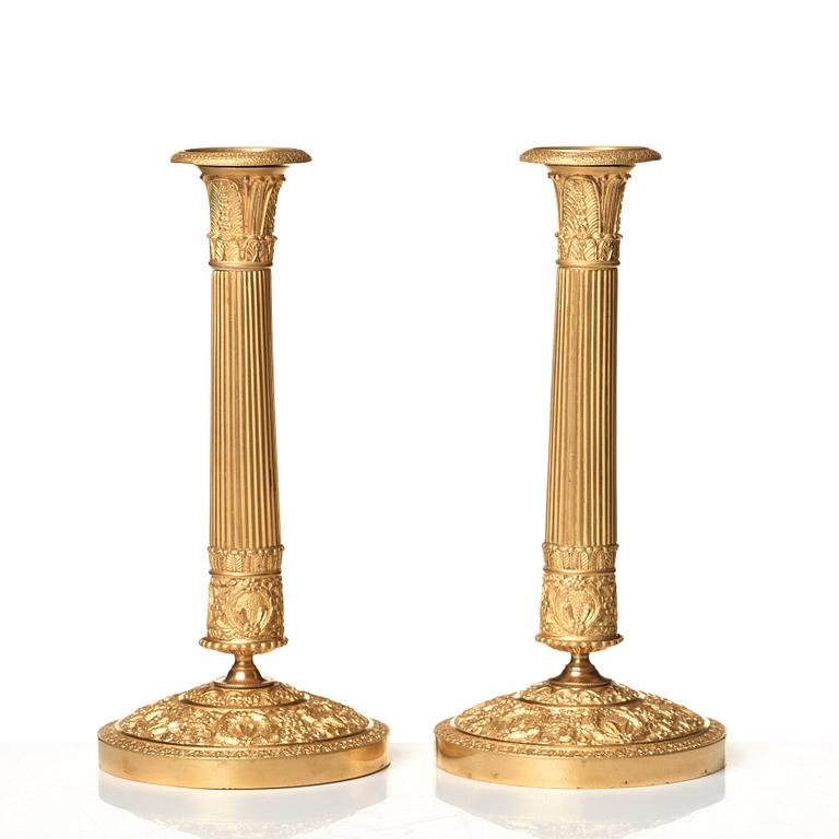 A pair of Empire candlesticks.