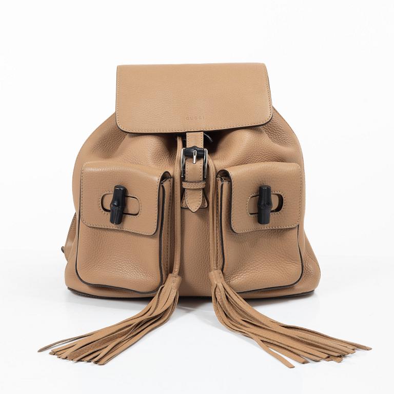 Gucci, a backpack.
