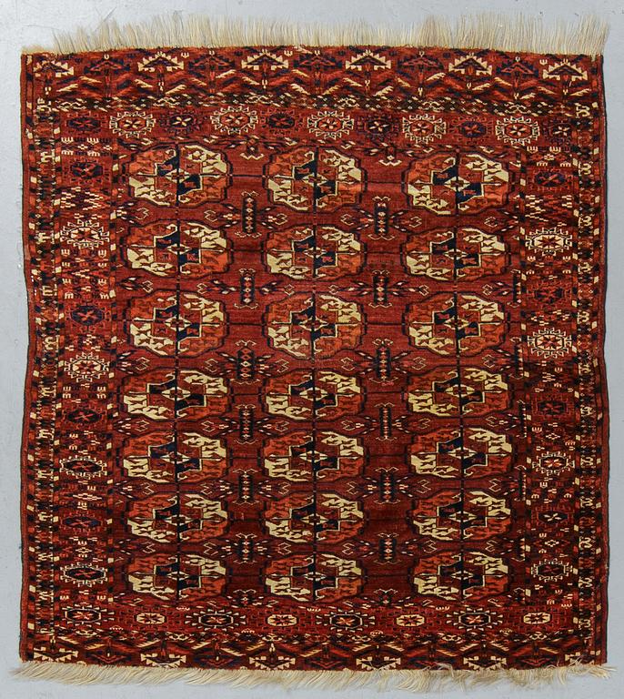 A rug, Antique Tekke, ca 115 x 115 cm.
