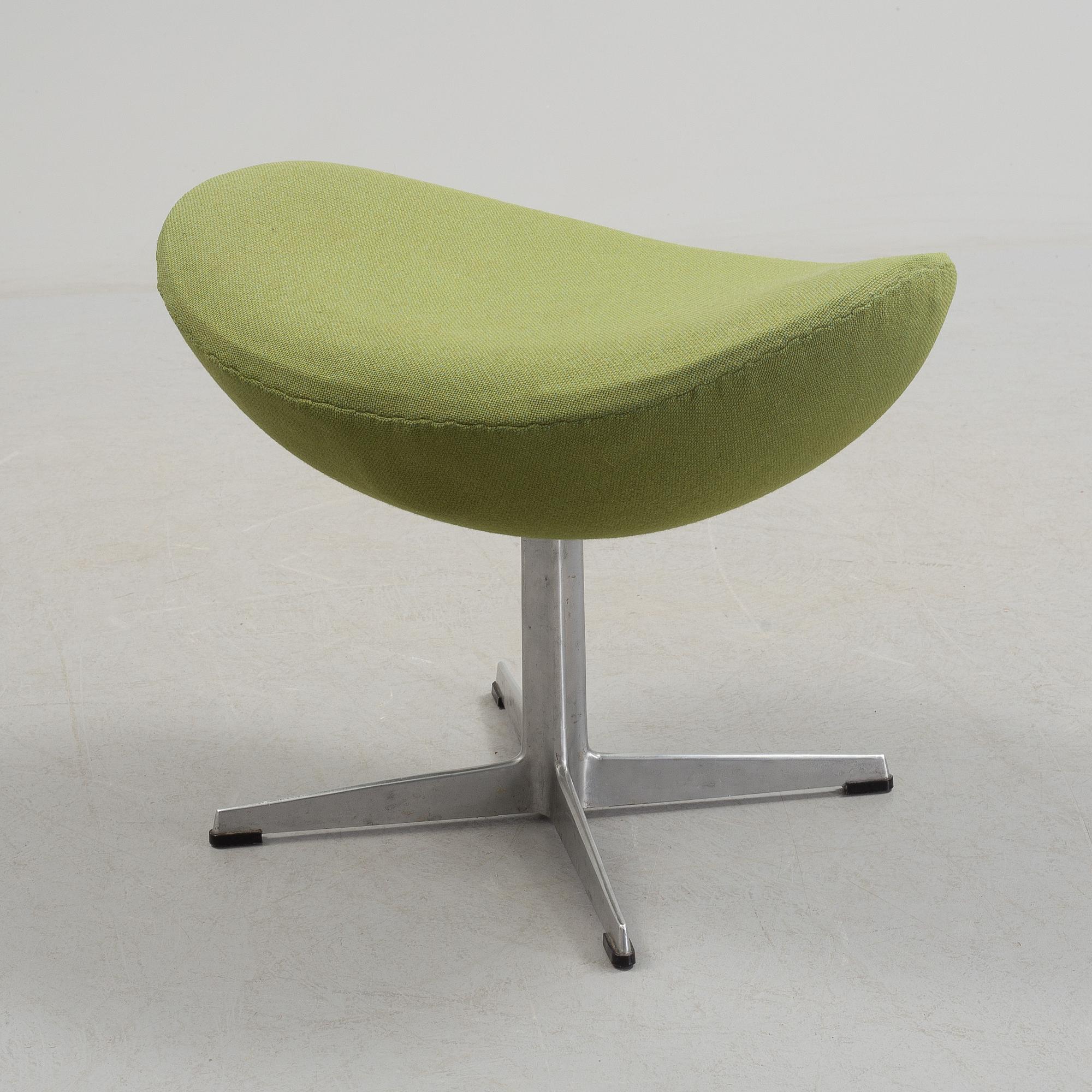 A Arne Jacobsen "Svanen" armchair and stool, second half of the 20th century.