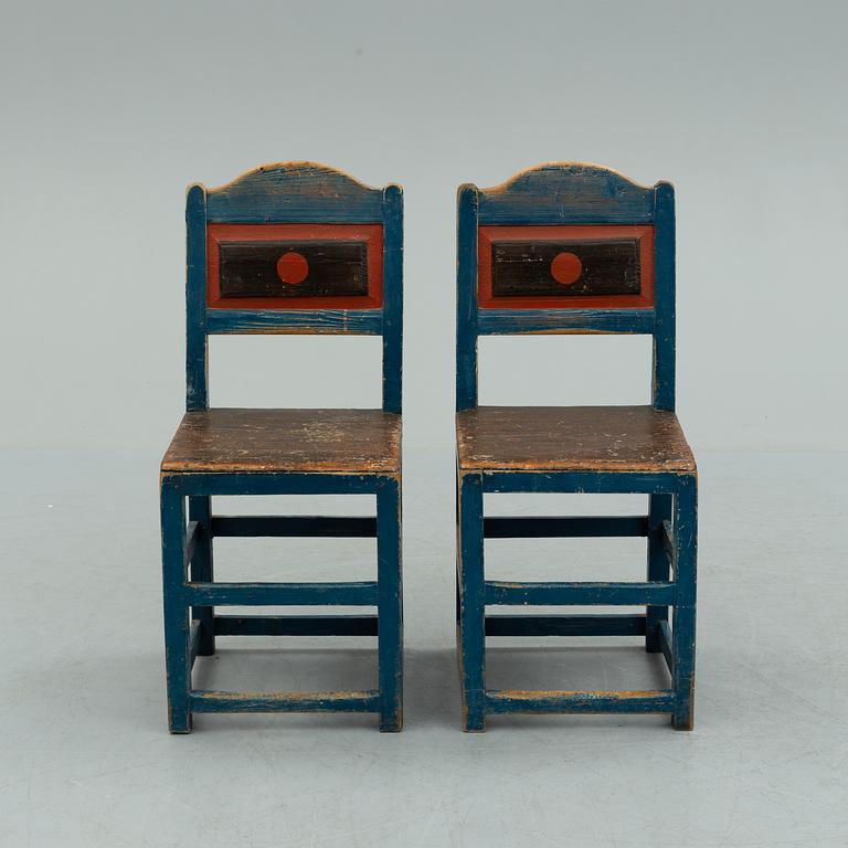 a pair of early 20th century chairs.