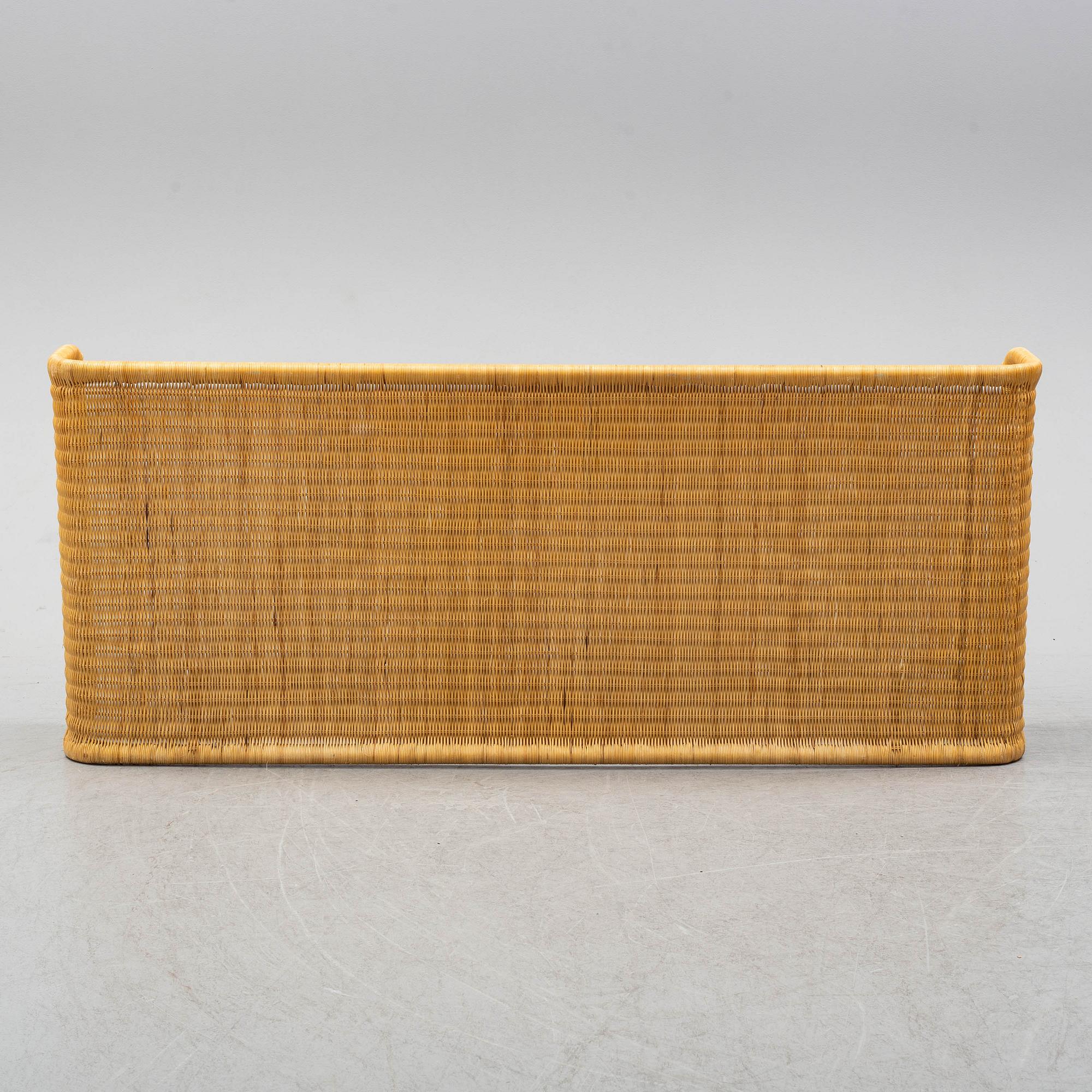 A late 20th century rattan bedside.