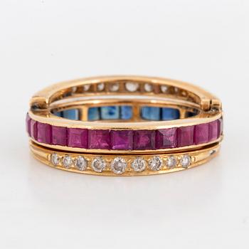Calibre-cut ruby and sapphire and brillint-cut diamond ring.