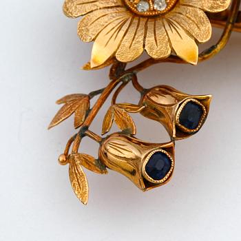 BROSCH, guld 14k, med diamanter samt syntetiska safirer. Vikt ca 20 gram.
