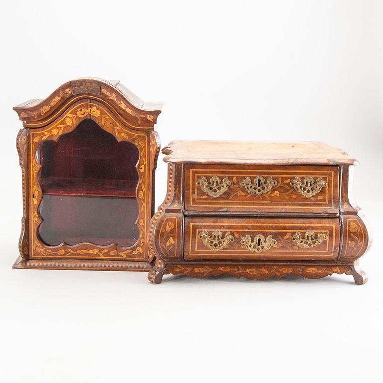 A Louis XV-style miniature cabinet around 1900.