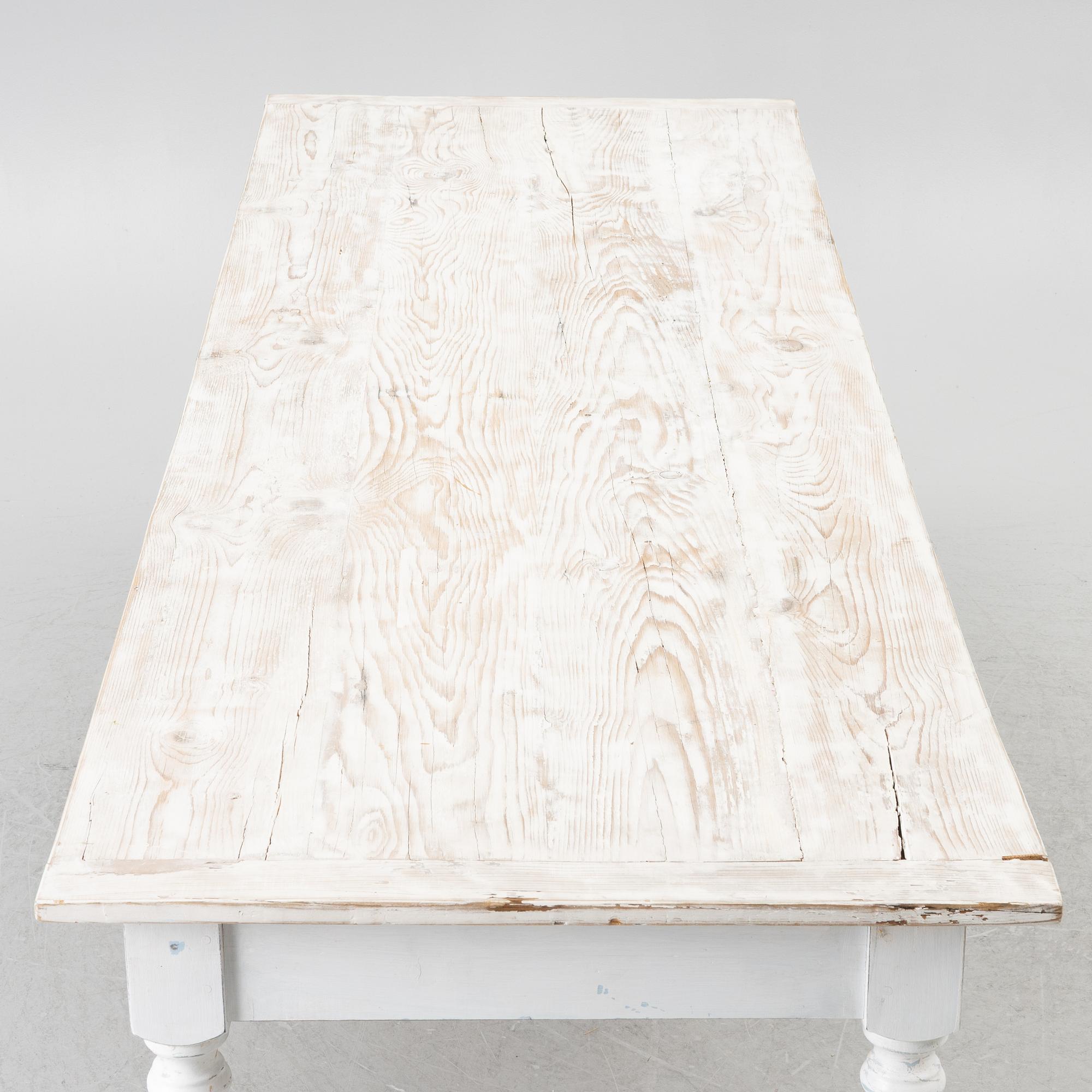 A table with stools, 20th/21st century.