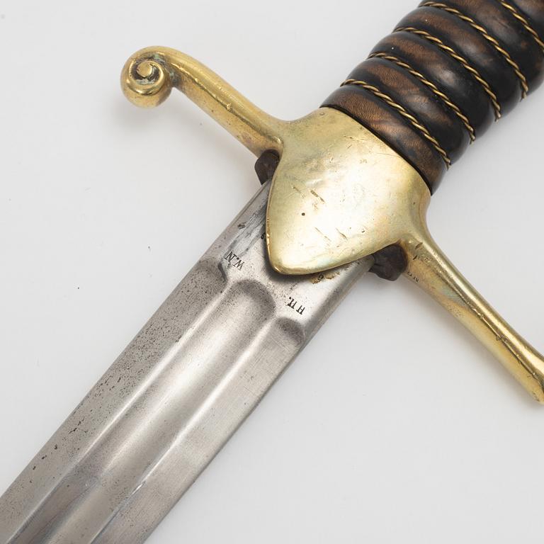 A Swedish artillery sabre 1889 pattern with scabbard.