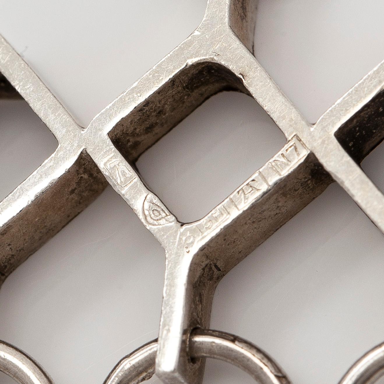 Jorma Laine, a set of two silver pendants, a bracelet and a brooch. Kultateollisuus Oy, Turku 1965-1972.