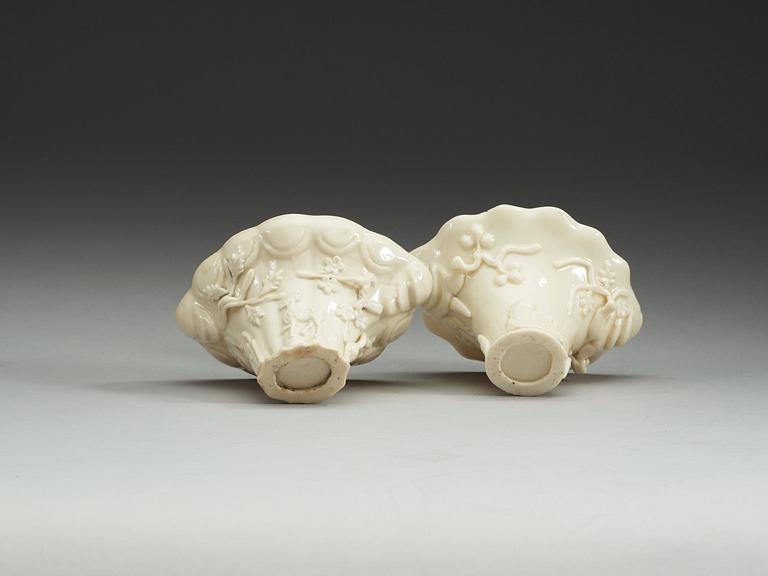 A set of two blanc de chine libation cups, Qing dynasty.