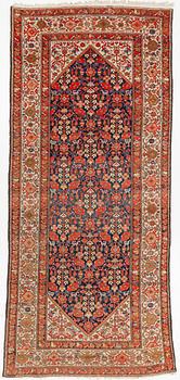 An antique Malayer carpet, west persia c 402 x 178 cm.