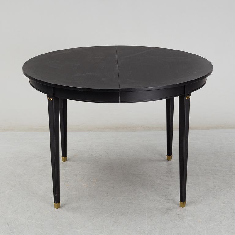A Gustavian style painted dining table, second half of the 20th century.