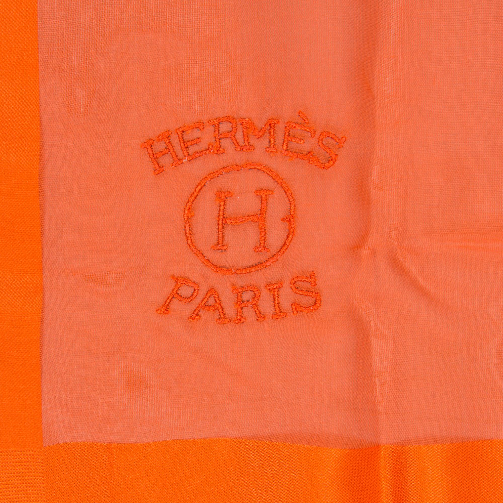 A silk scarf by Hermès.