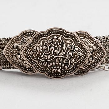 A silver belt from Nepal.