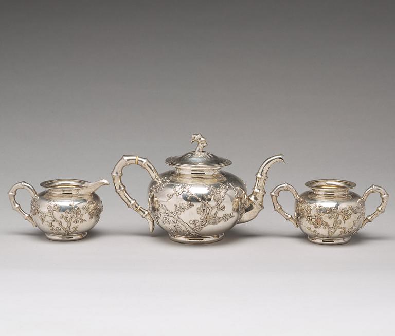 A Chinese export silver three-piece tea service, mark of Luen Wo, Shanghai, circa 1880-1925.