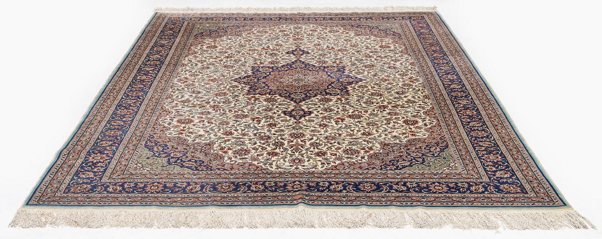 A silk Kayseri/Hereke carpet, c. 310 x 195 cm.