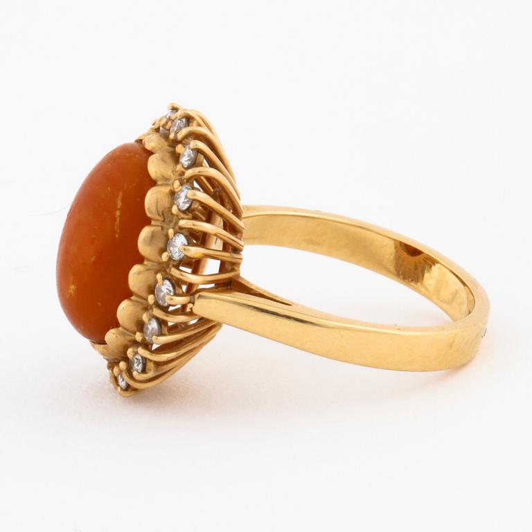 A amber and brilliant cut diamond ring by Walters guldsmedja, Stockholm, 1991.