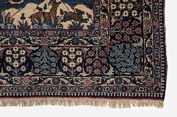 An antique pictoral Tehran rug, North Persia, c. 202 x 138 cm.