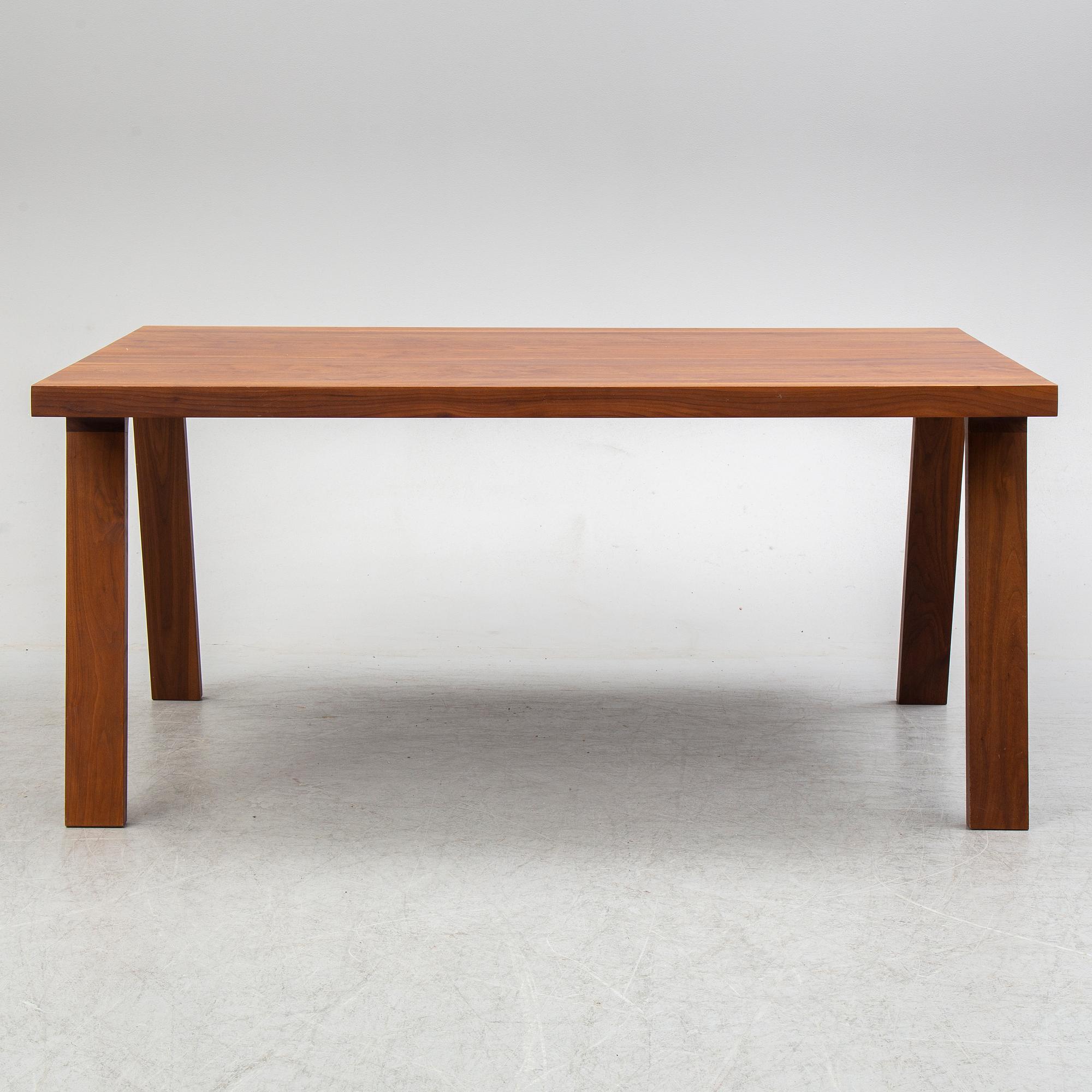 GIJS PAPAVOINE, A walnut 'Doble' dining table from Montis, The Netherlands, 2014.