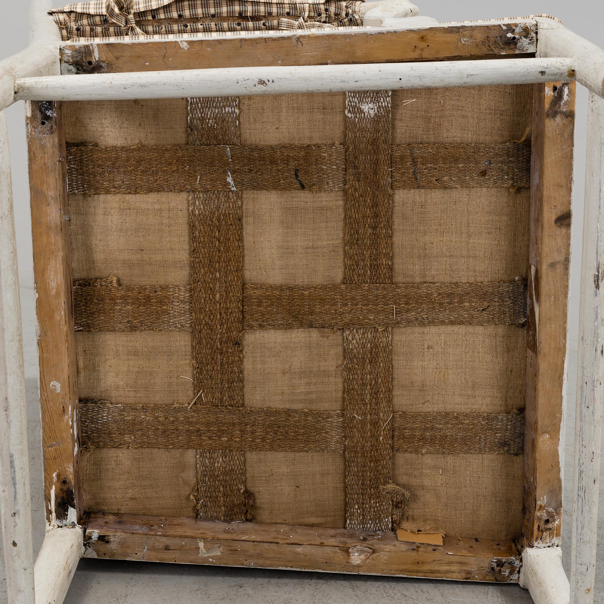 A painted armchair from around year 1800.