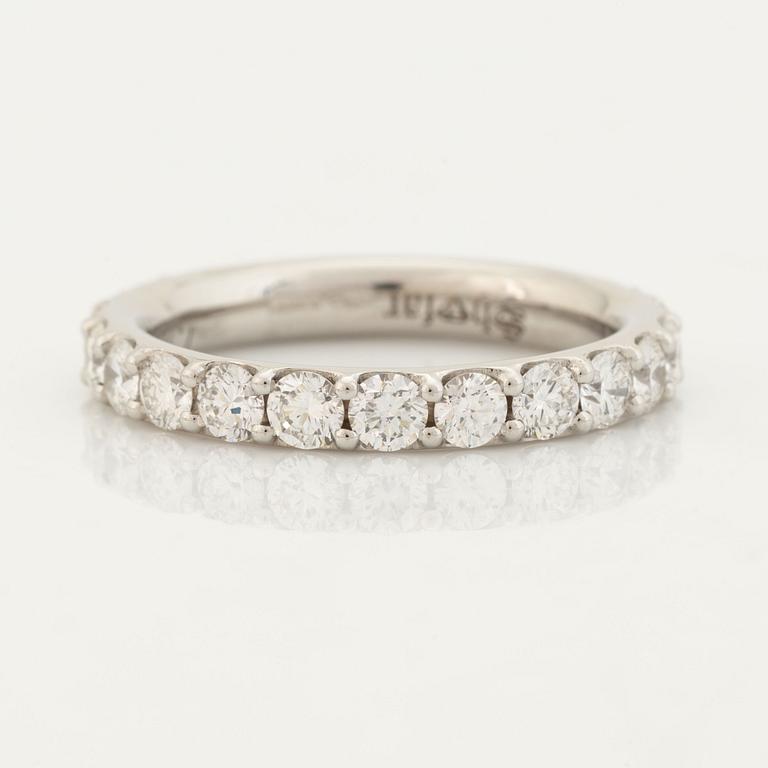 Brilliant cut diamond eternity ring.