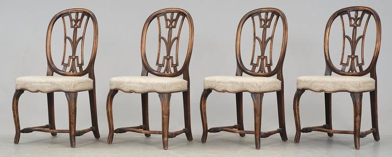 An Axel Einar Hjorth set of 4 Swedish Grace chairs and a pair of armchairs, 'Östanå', Nordiska Kompaniet, 1929.