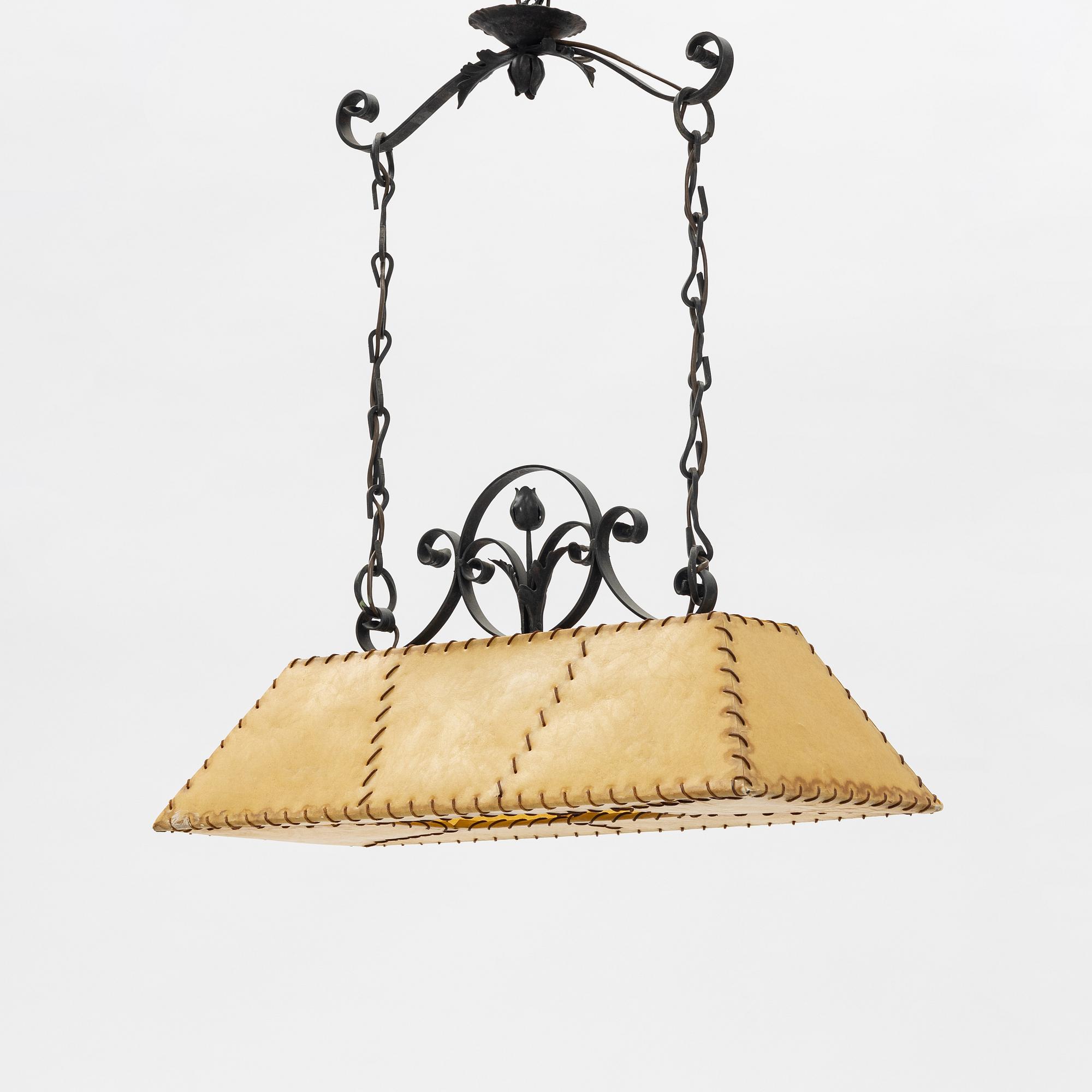 A chalet style mid century modern ceiling lamp.