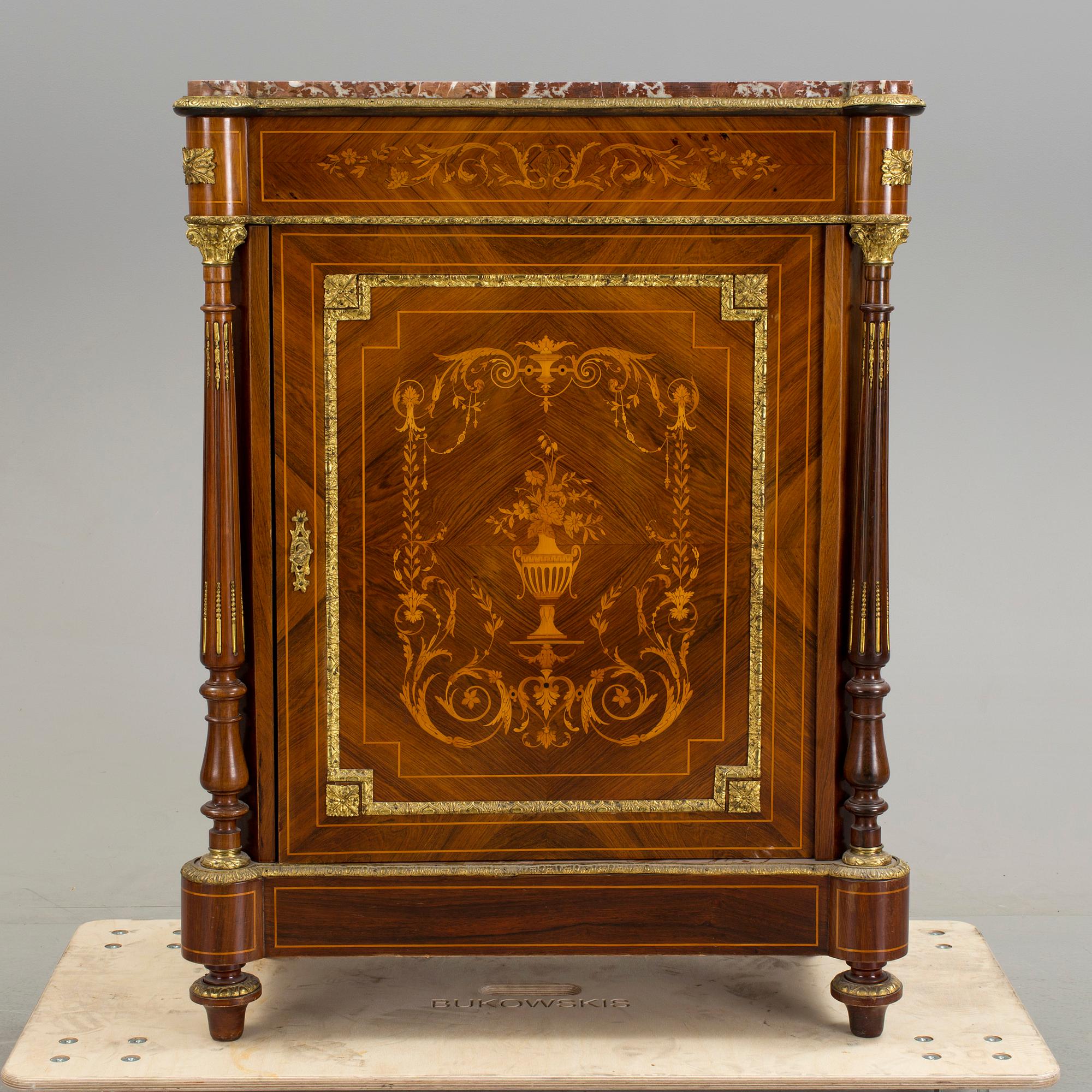 An early 20th century Louis XVI style cabinet.