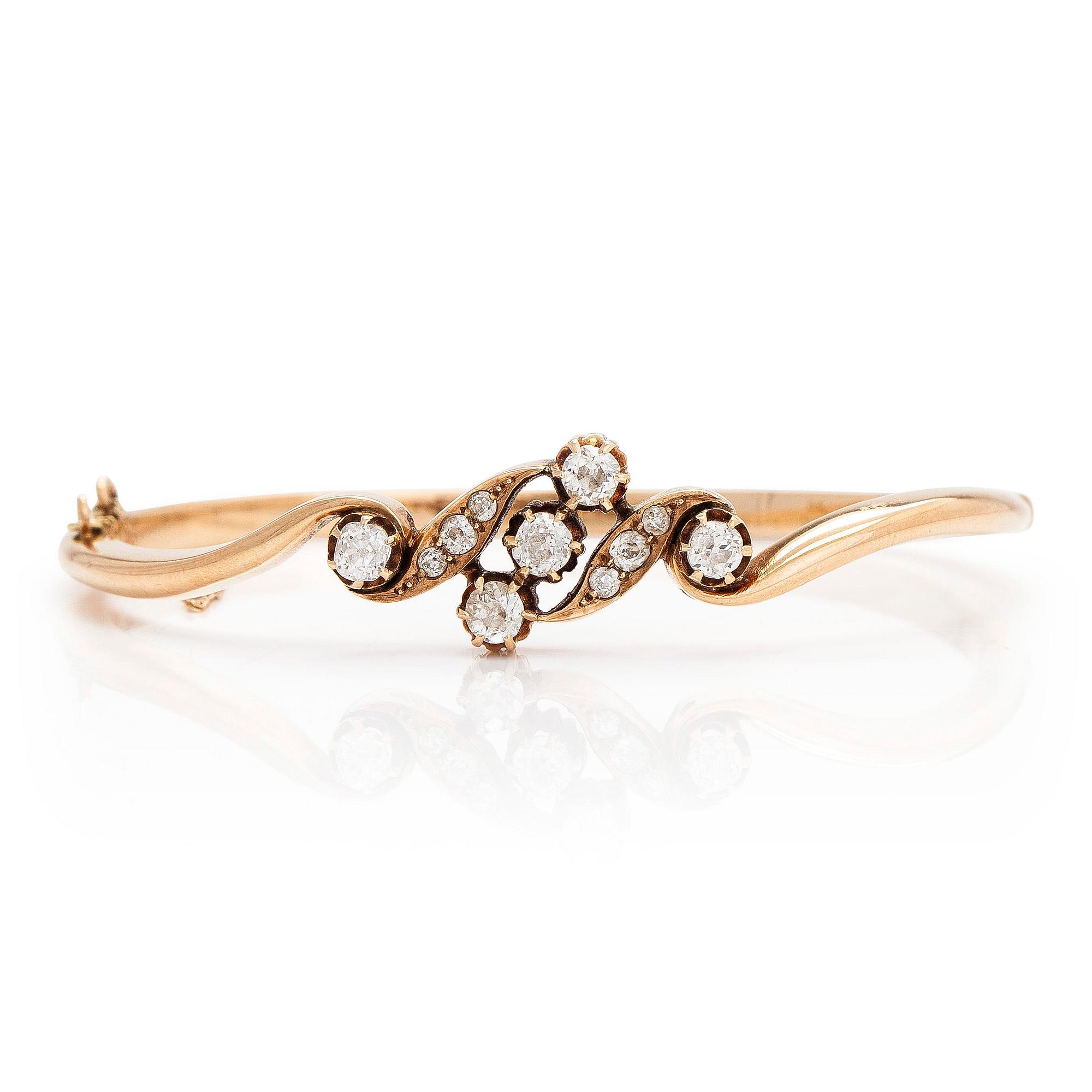 A 14K gold bangle, set with old-cut diamonds, St. Petersburg 1882-1898.