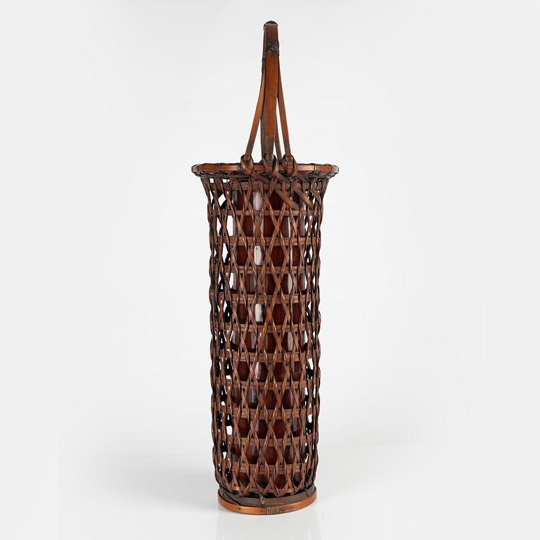 A Japanese Ikebana flower basket, 20th Century. Signed.