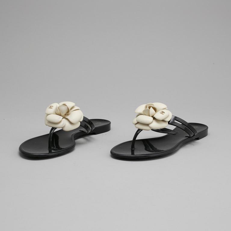 CHANEL, a pair of black plastic sandals. Size 38.