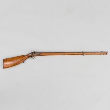 An 18th century percussion gun.