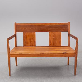 A pine sofa from Nordiska Kompaniet, before 1909.