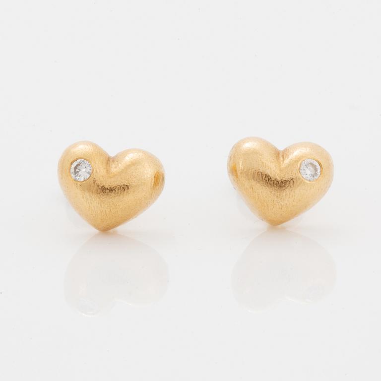 Ole Lynggaard heart shpade 14K gold and diamond earrings.