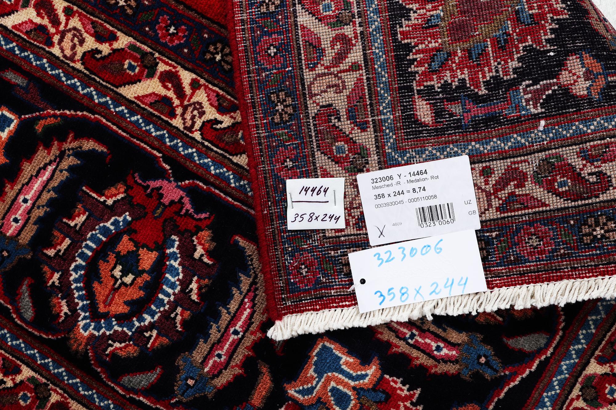 A carpet, Mashad, c. 358 x 244 cm.